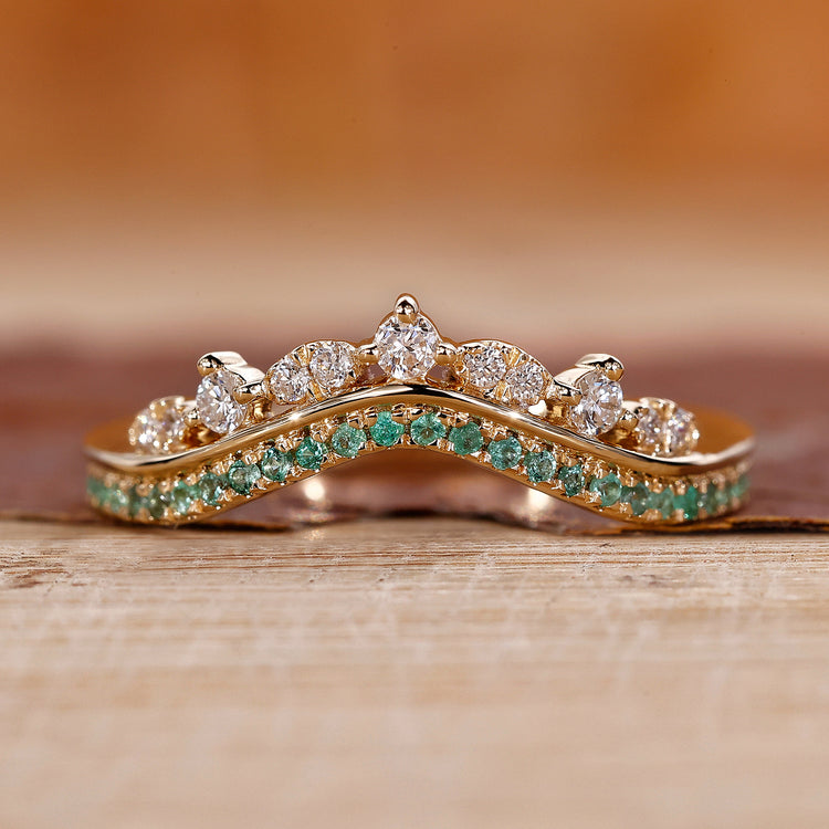 Emerald and diamond crown wedding band.

