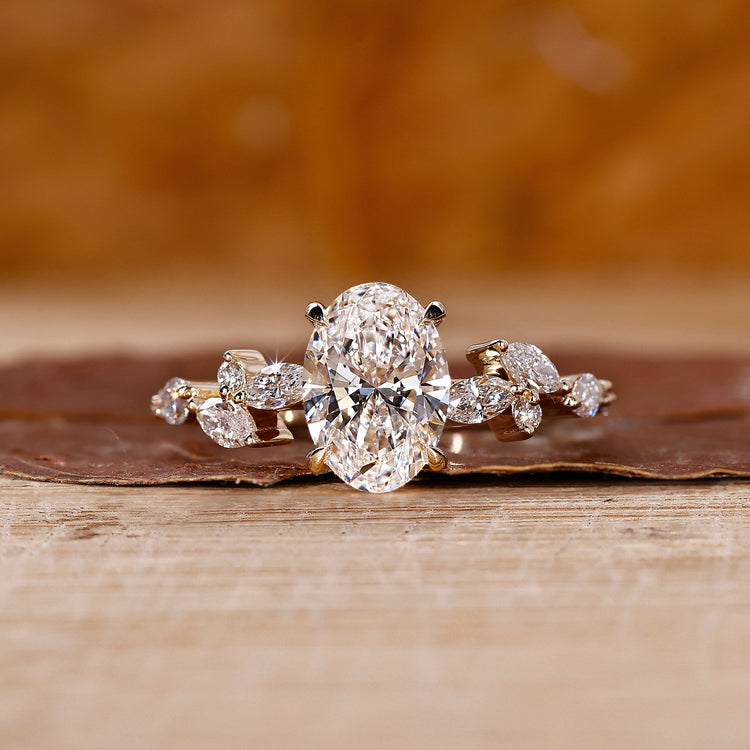 Halo Oval Ring Engagement with yellow gold ring
