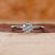 Solitaire engagement ring with nature inspired ring design.
