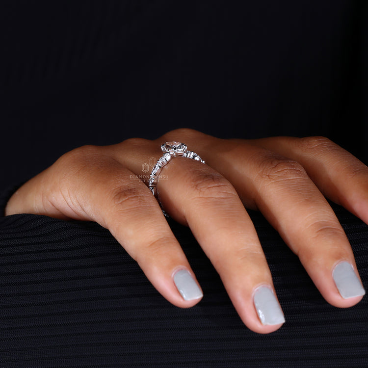 White gold ring with Dutch marquise cut and handmade detail.
