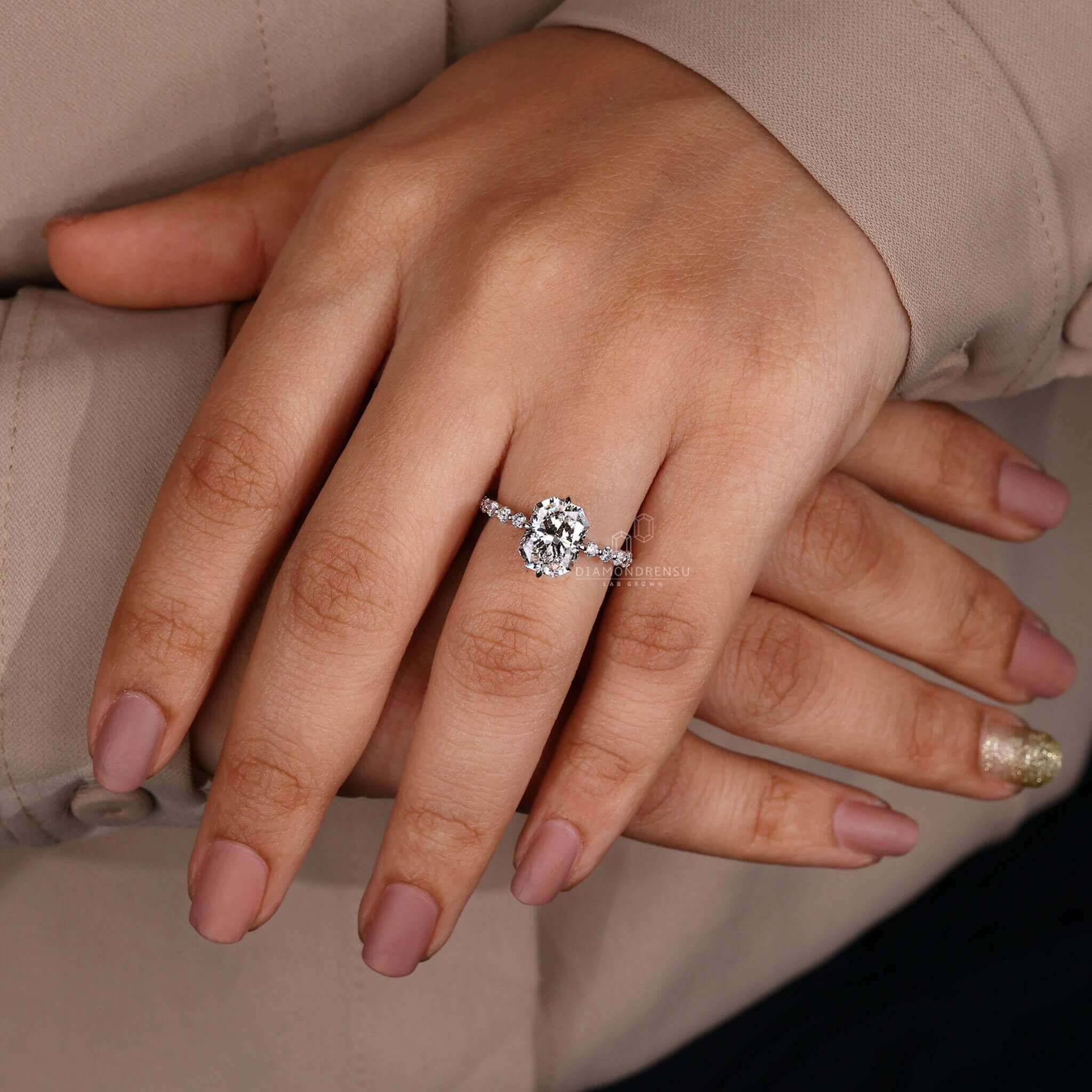 Radiant cut ring crafted with a claw prong engagement ring setting in white gold.