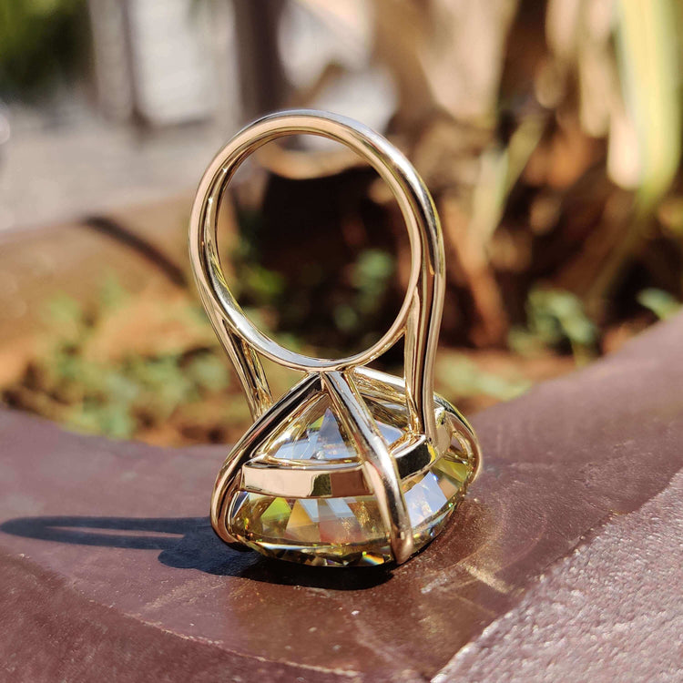 Custom engagement ring with light yellow moissanite.
