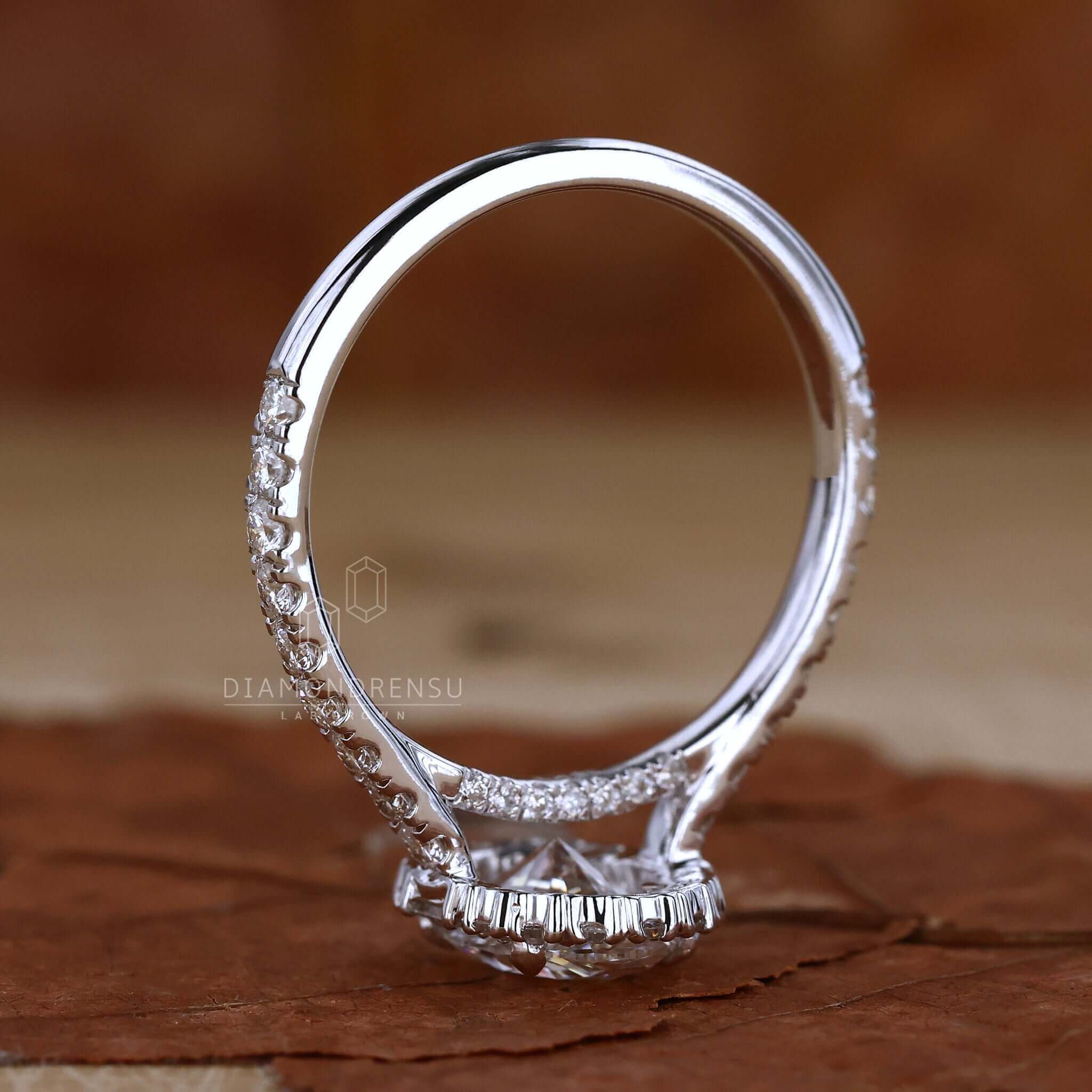 Side View of 1 Carat Oval Diamond Ring Highlighting Halo Design