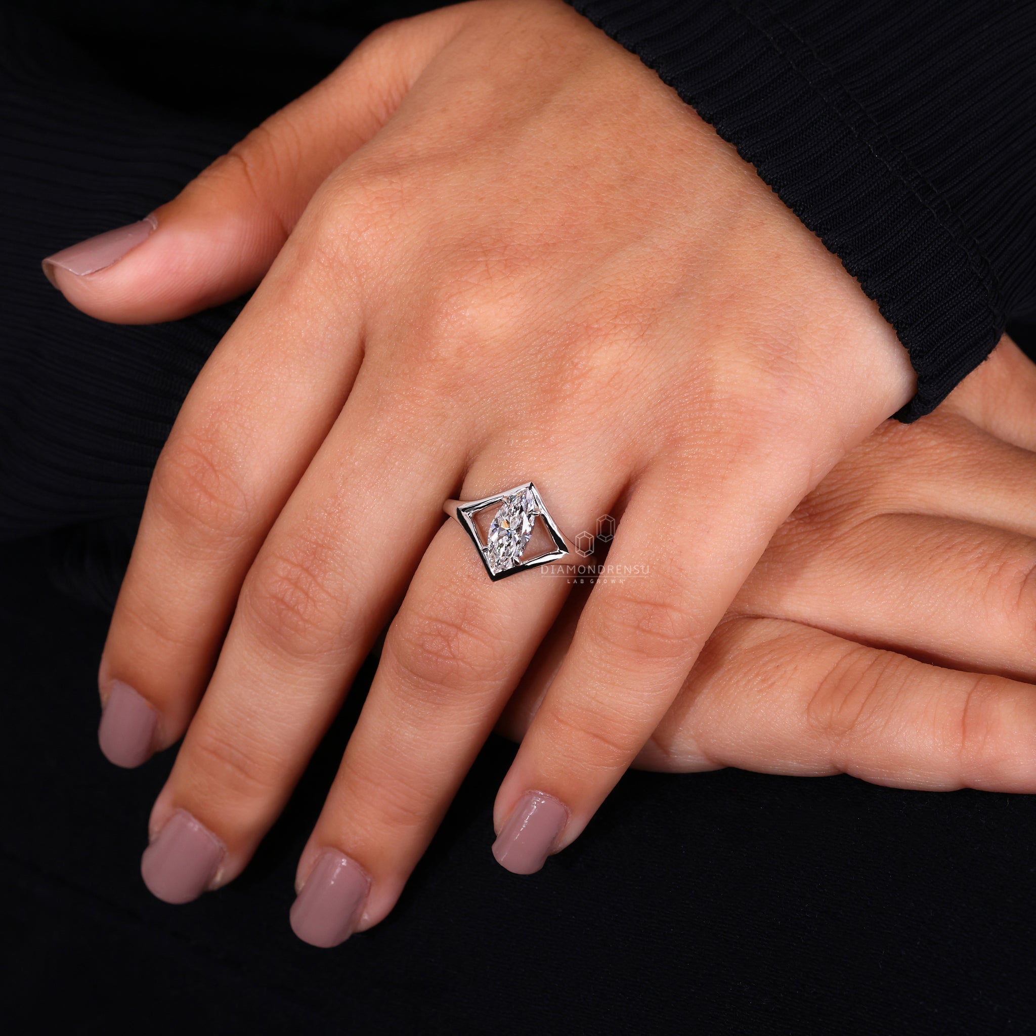 Split shank engagement ring on diamond white gold ring.
