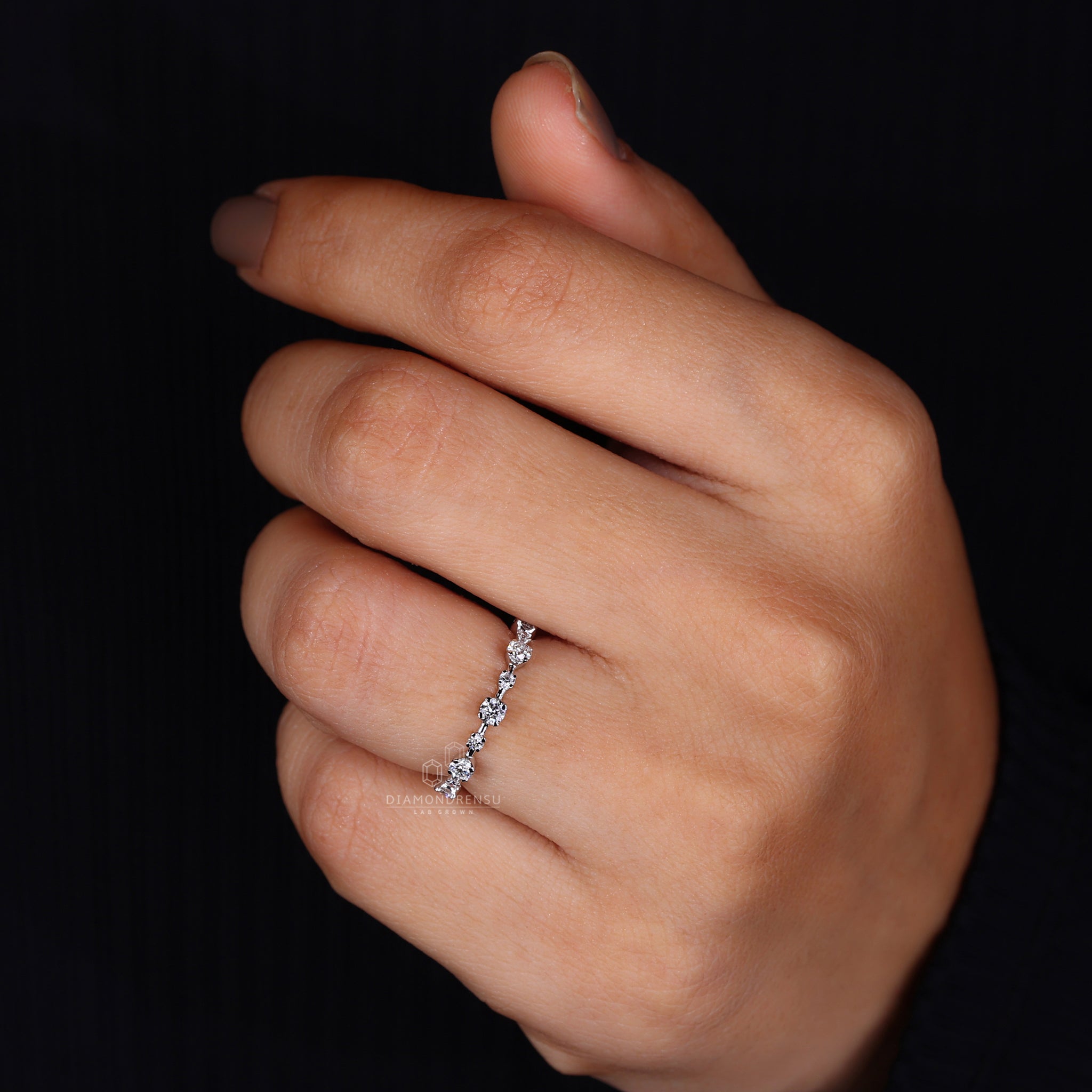 Handmade white gold round diamond eternity band
