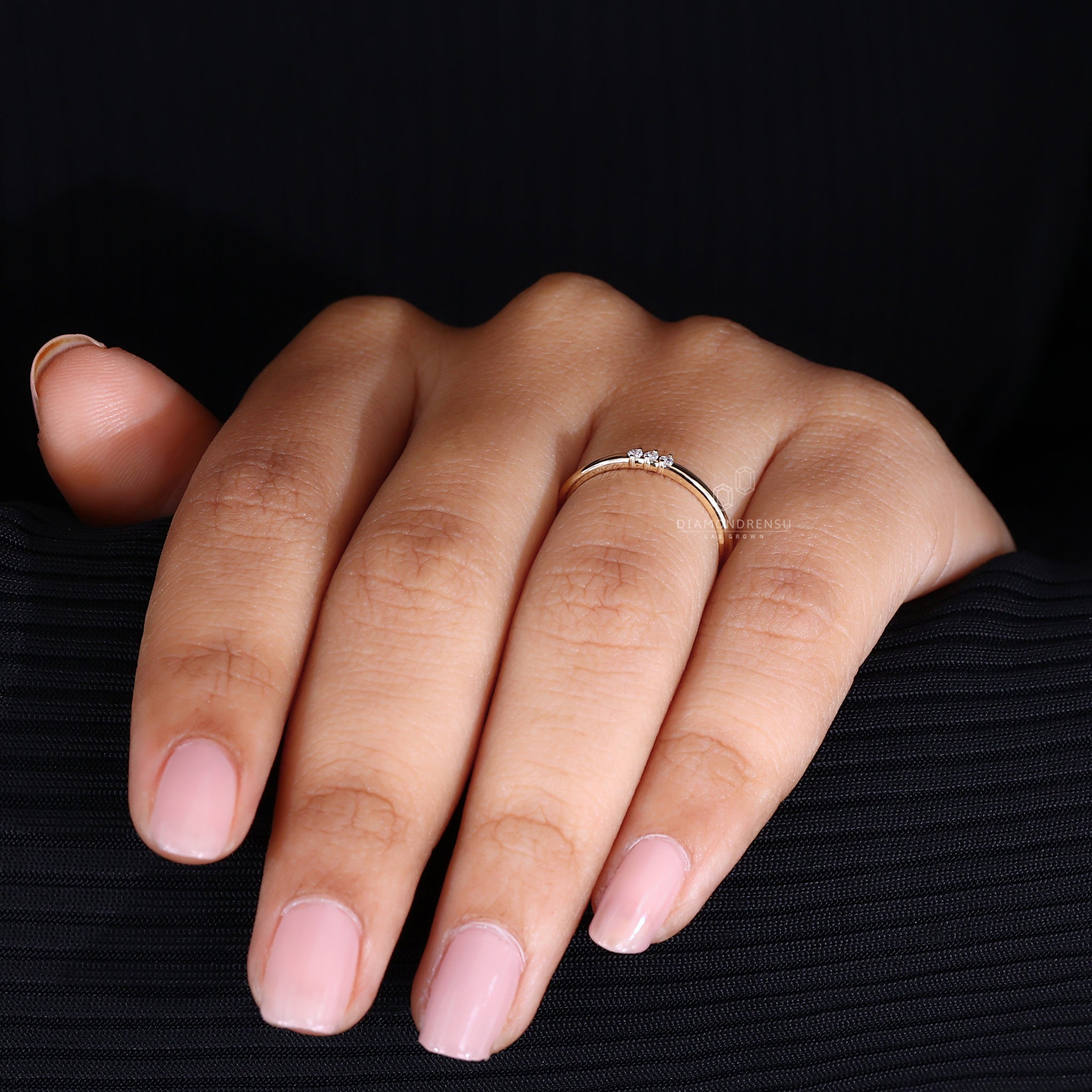 Handmade three stone diamond band.
