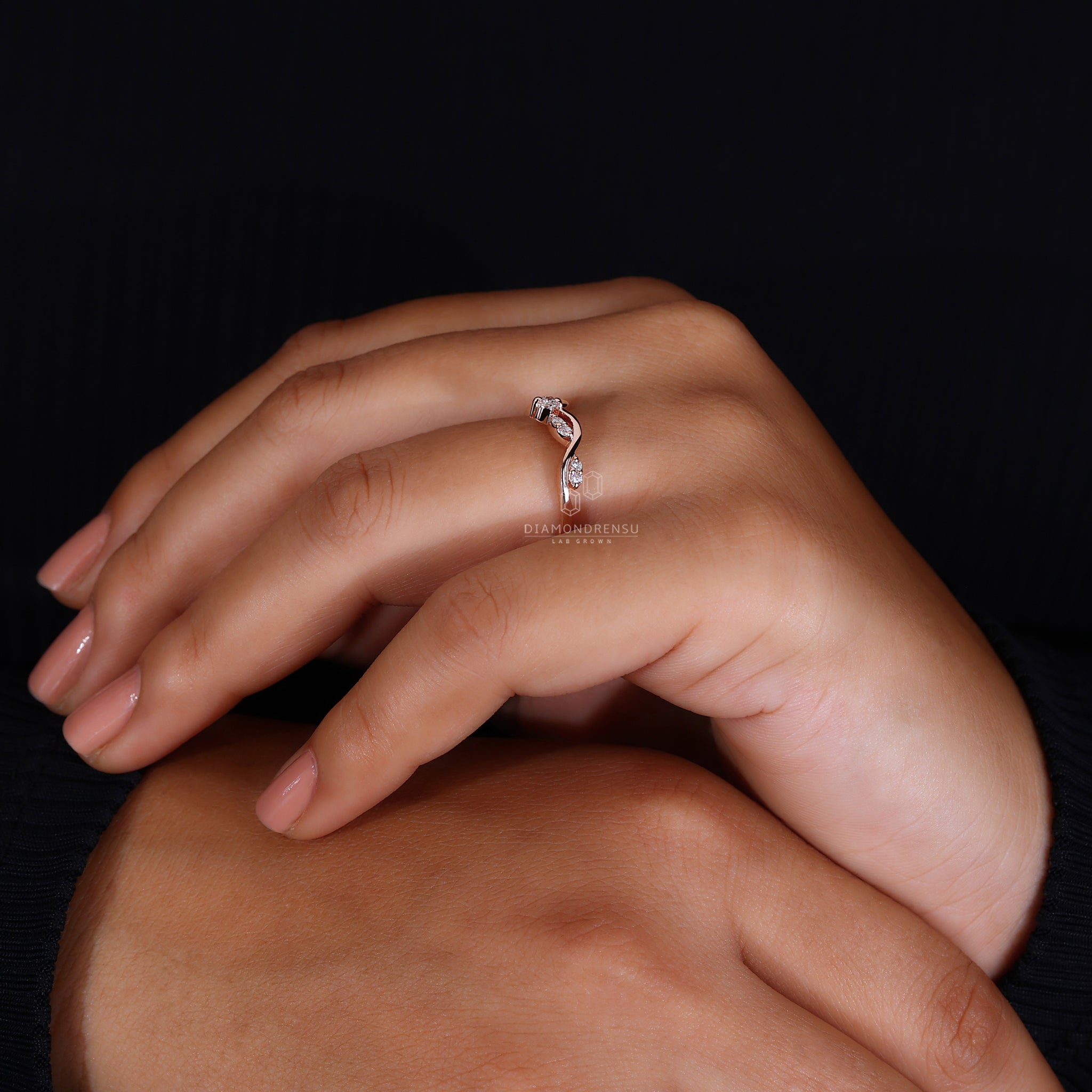 Diamondrensu UK curved rose gold wedding band.
