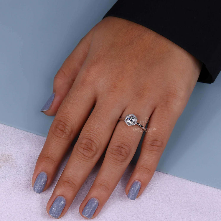 Cathedral ring setting round diamond crafted to perfection for brilliance.