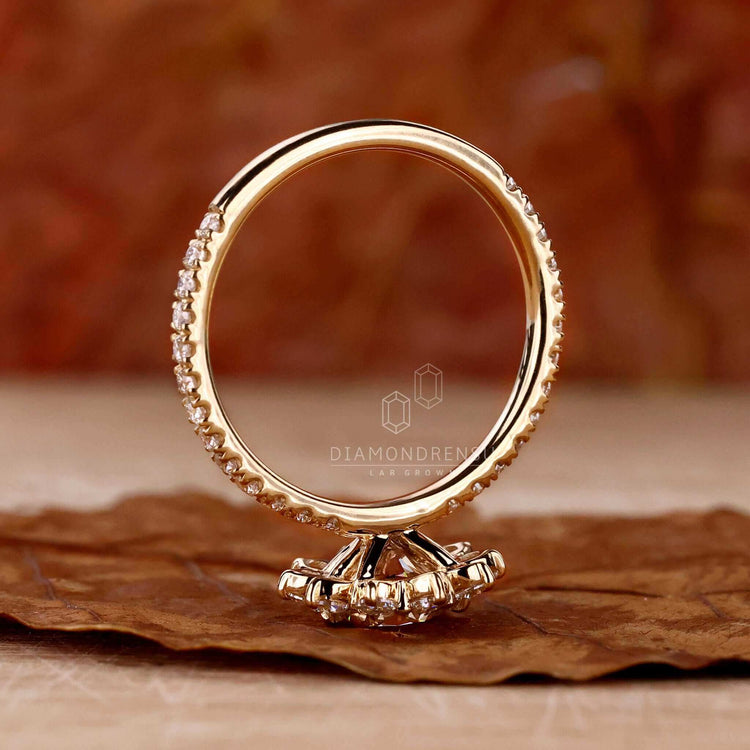 Gold cluster ring with pave diamond accents for a classic touch.