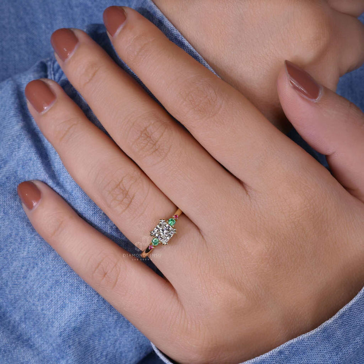 Princess cut engagement ring featuring a gold band and unique side stones engagement ring design for timeless beauty.
