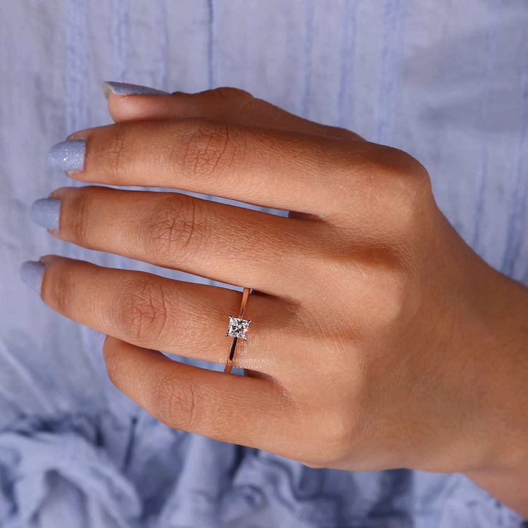 Simple solitaire ring in a claw prong setting for effortless beauty.
