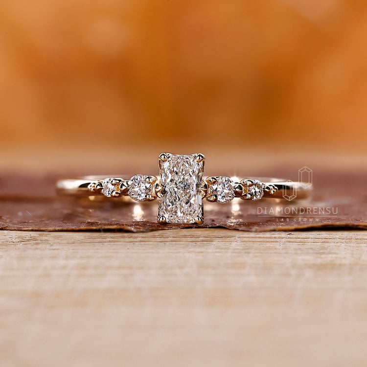 Yellow gold diamond ring with lab grown stones.
