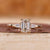 3 stone emerald cut diamond ring in yellow gold, made for UK engagement ring buyers.
