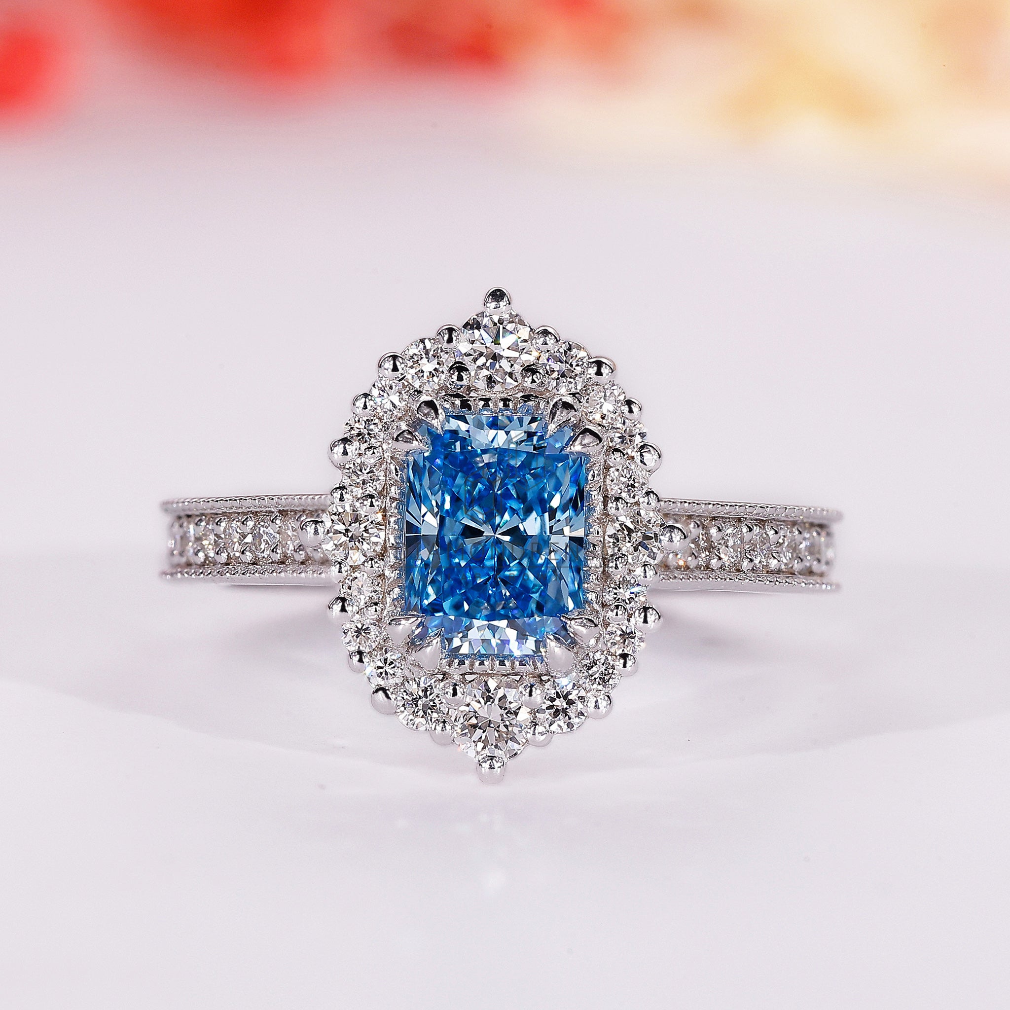 Radiant Cut Diamond Ring is designed using a white gold ring and round diamond ring.
