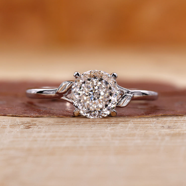 Portuguese cut diamond ring with solitaire engagement ring.
