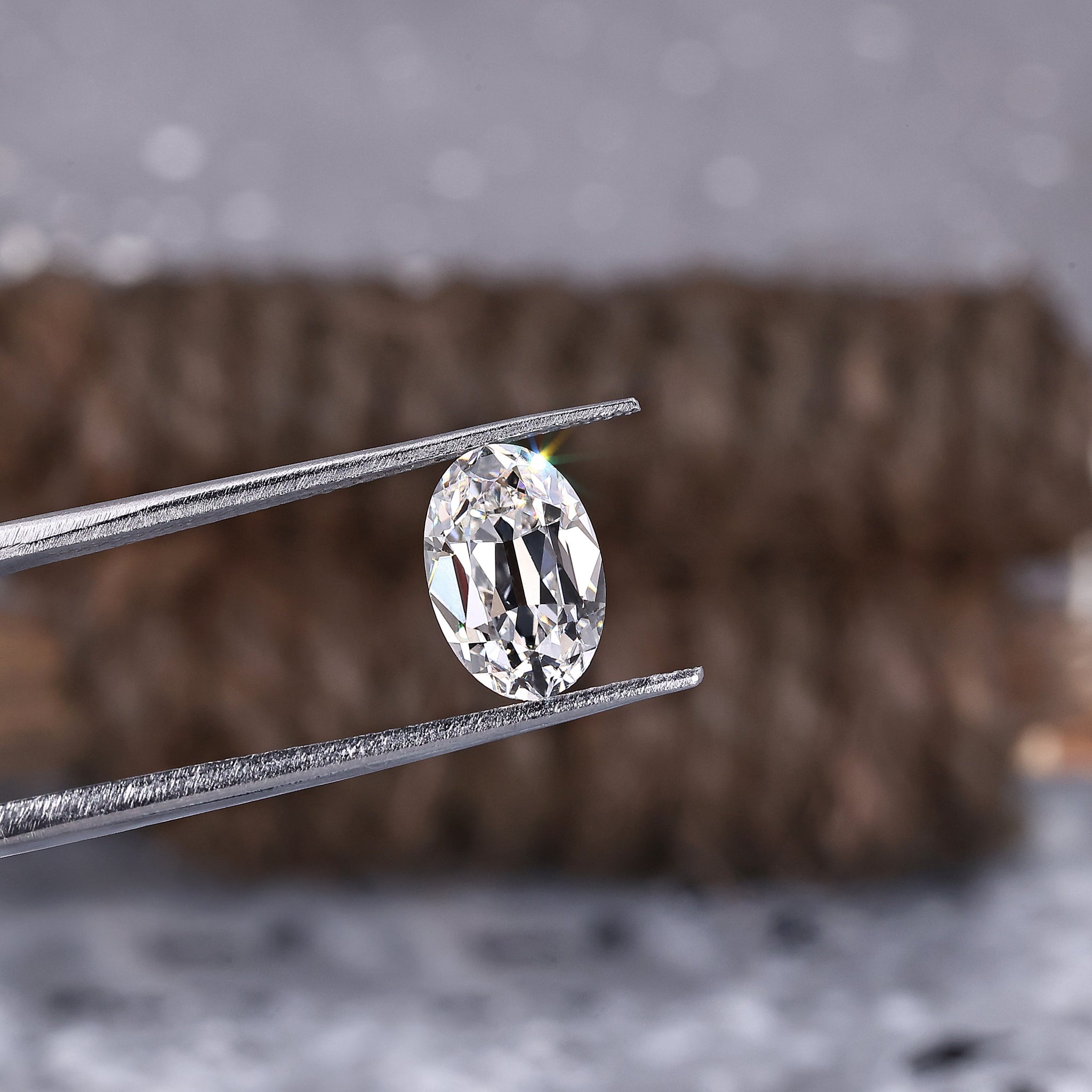 Old mine cut oval diamond with 2.06 carat weight and IGI certification.

