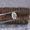Old mine cut oval diamond with 2.06 carat weight and IGI certification.
