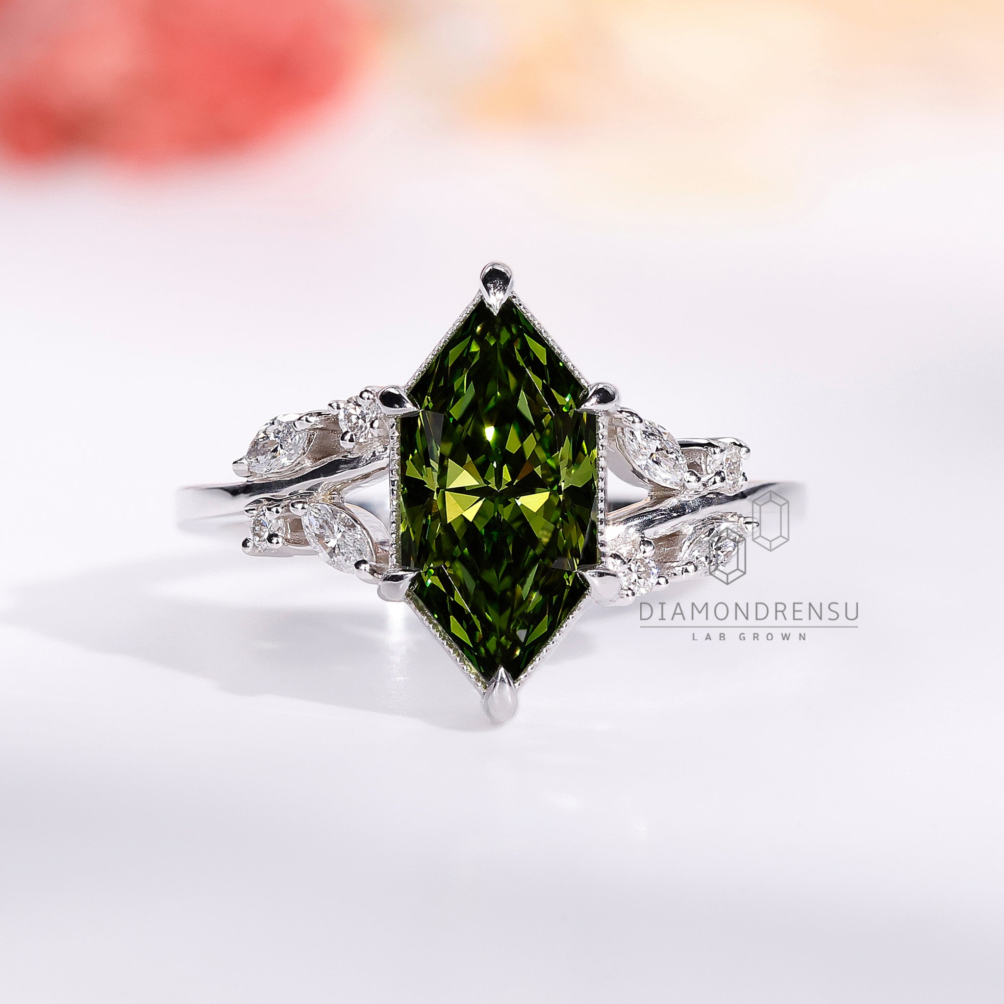 Detailed view of Dutch marquise ring with marquise and round sidestones, a nature inspired design by Diamondrensu