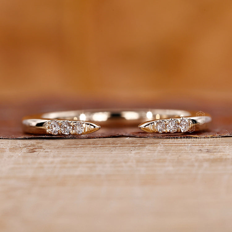 Unique wedding band in prong setting