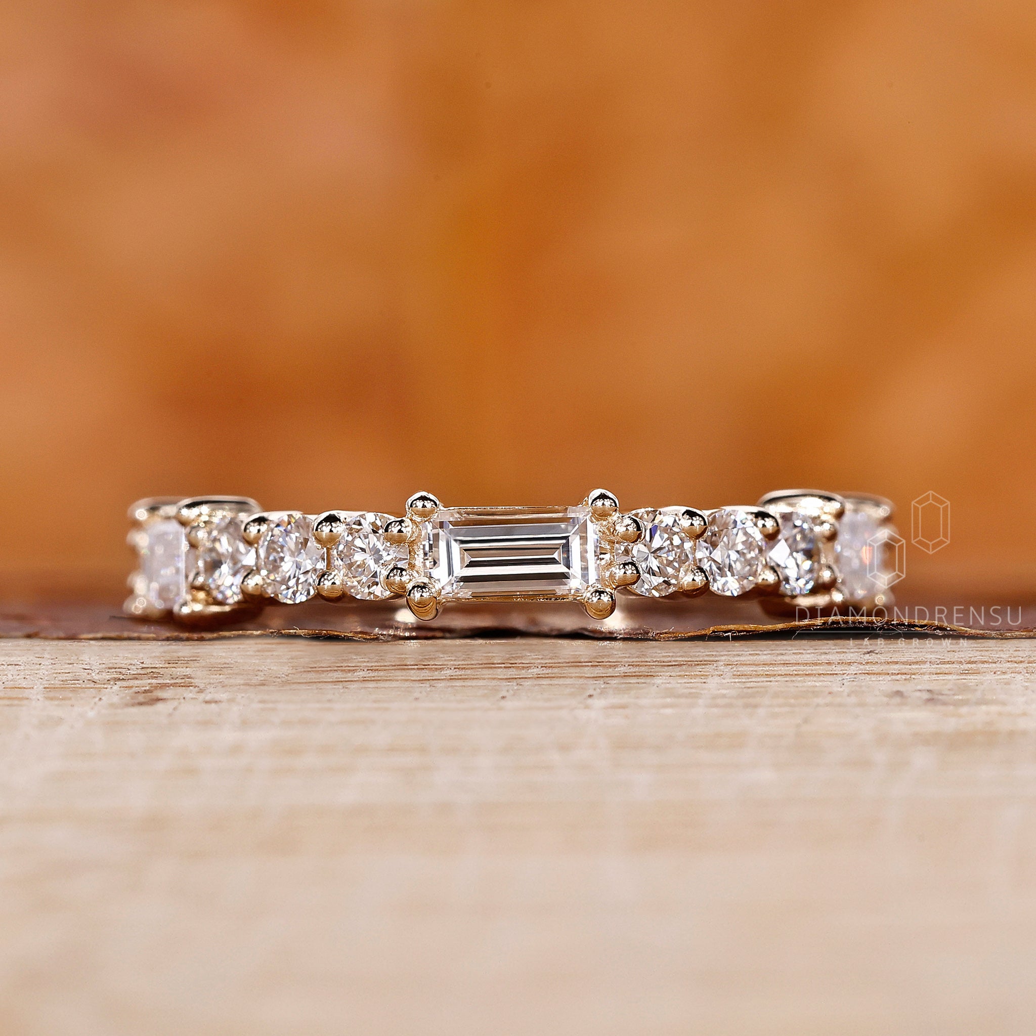 Half eternity wedding band in prong setting
