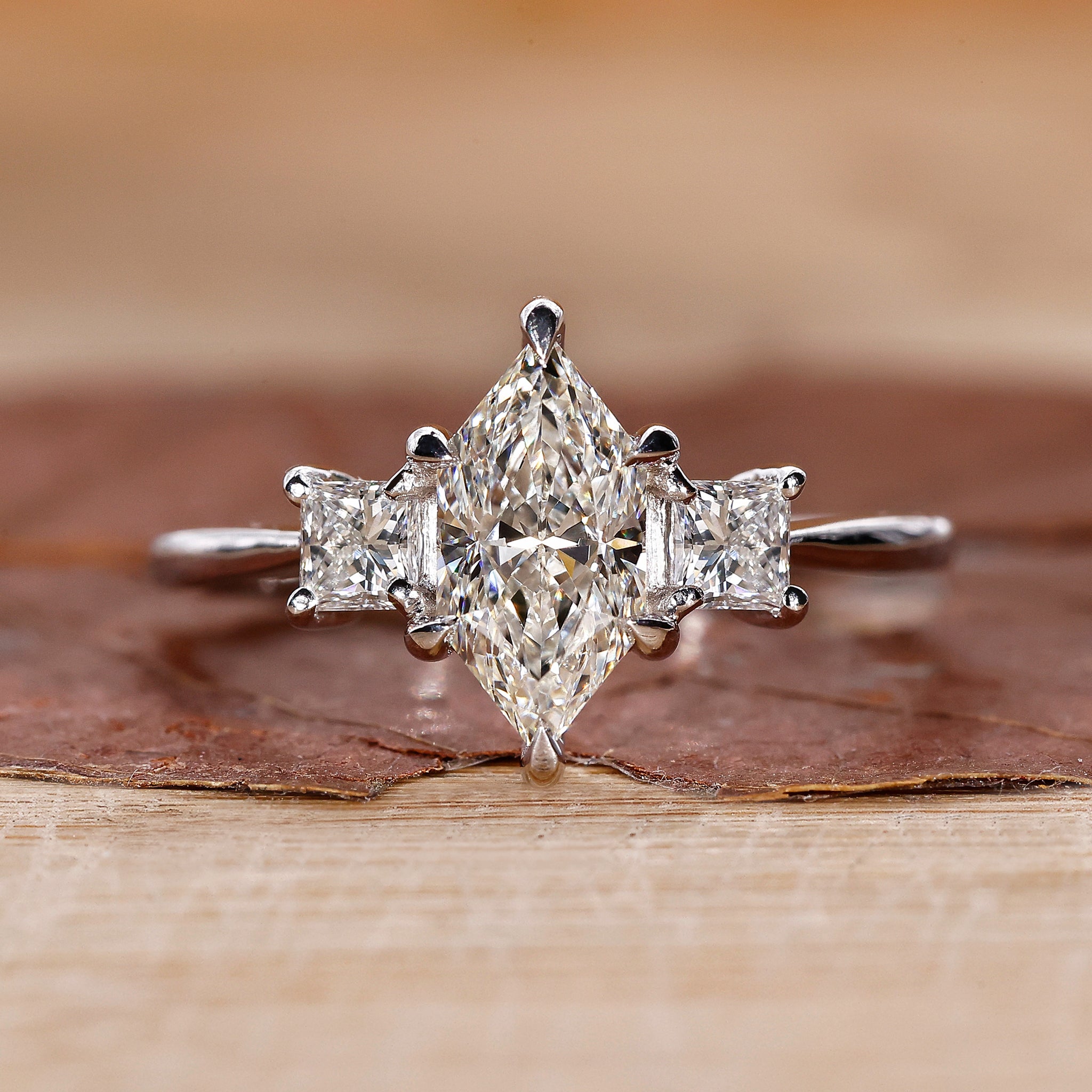 3 stone engagement ring with Dutch marquise diamond ring.
