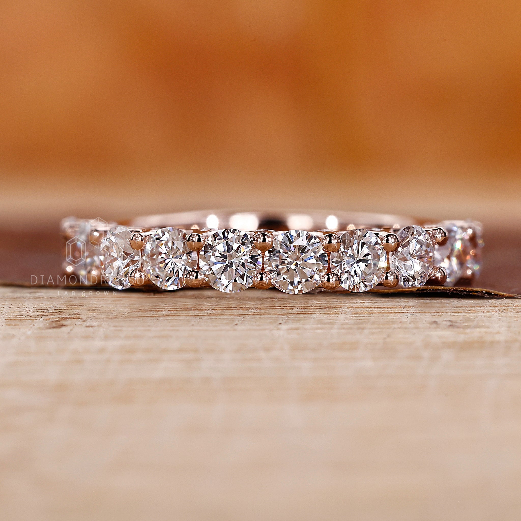 Half eternity wedding band with round diamond
