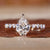 Pave diamond ring with a stunning spear cut design.