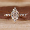 Dutch Marquise ring with shared prong pave band.
