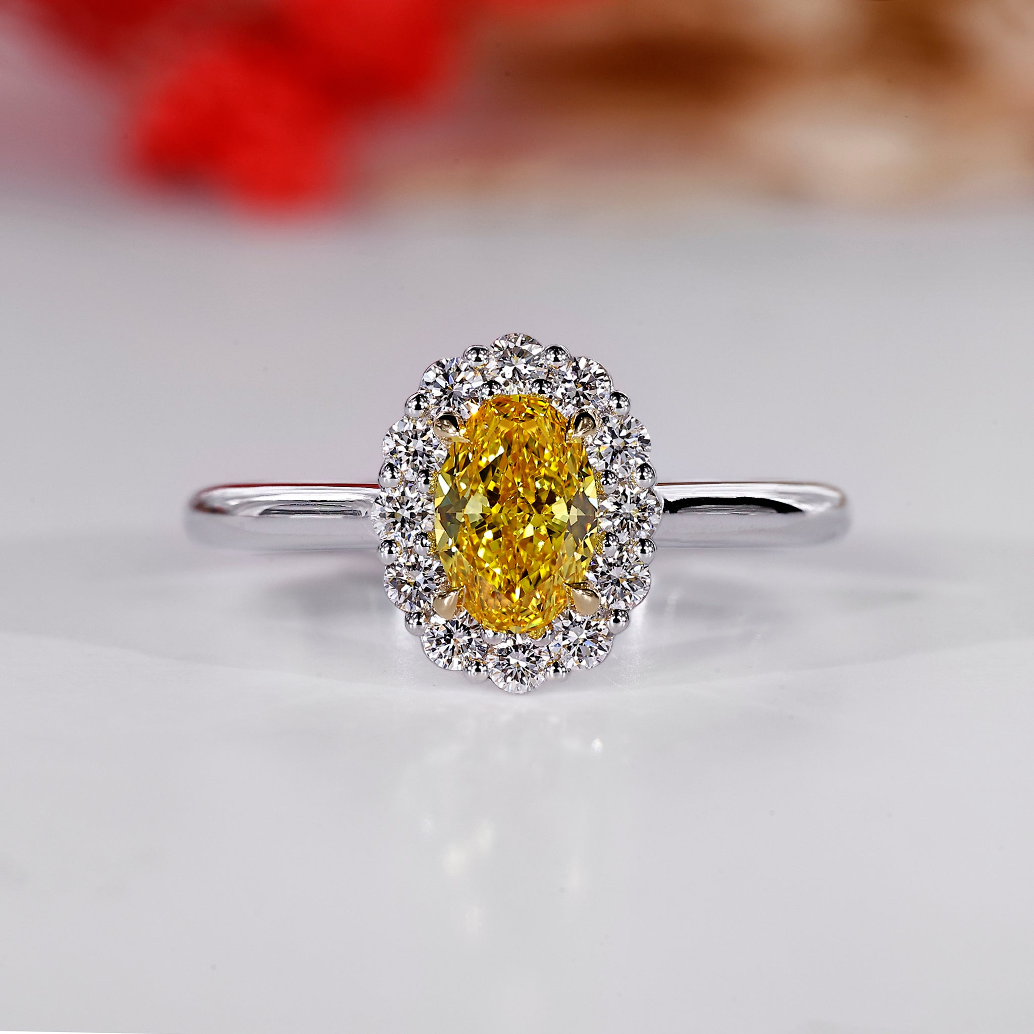 Oval cut diamond ring with a cathedral setting.

