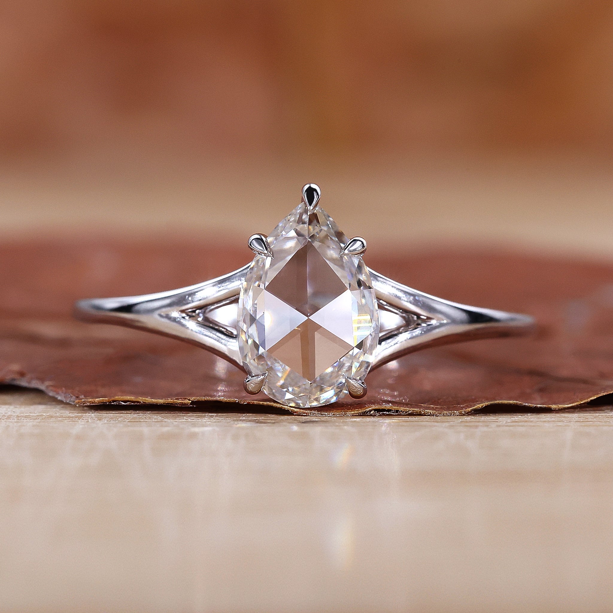 Rose Cut Diamond Ring is made using a white gold ring.
