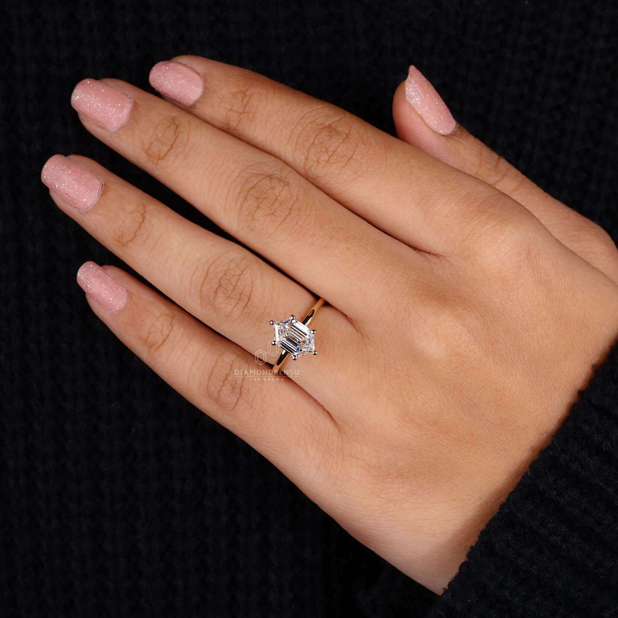 Hexagon step cut diamond engagement ring for a bold and sophisticated statement.