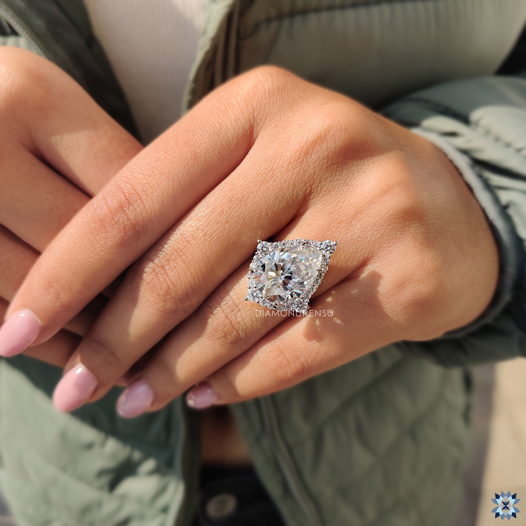 Bridge accent ring with pear shaped ring
