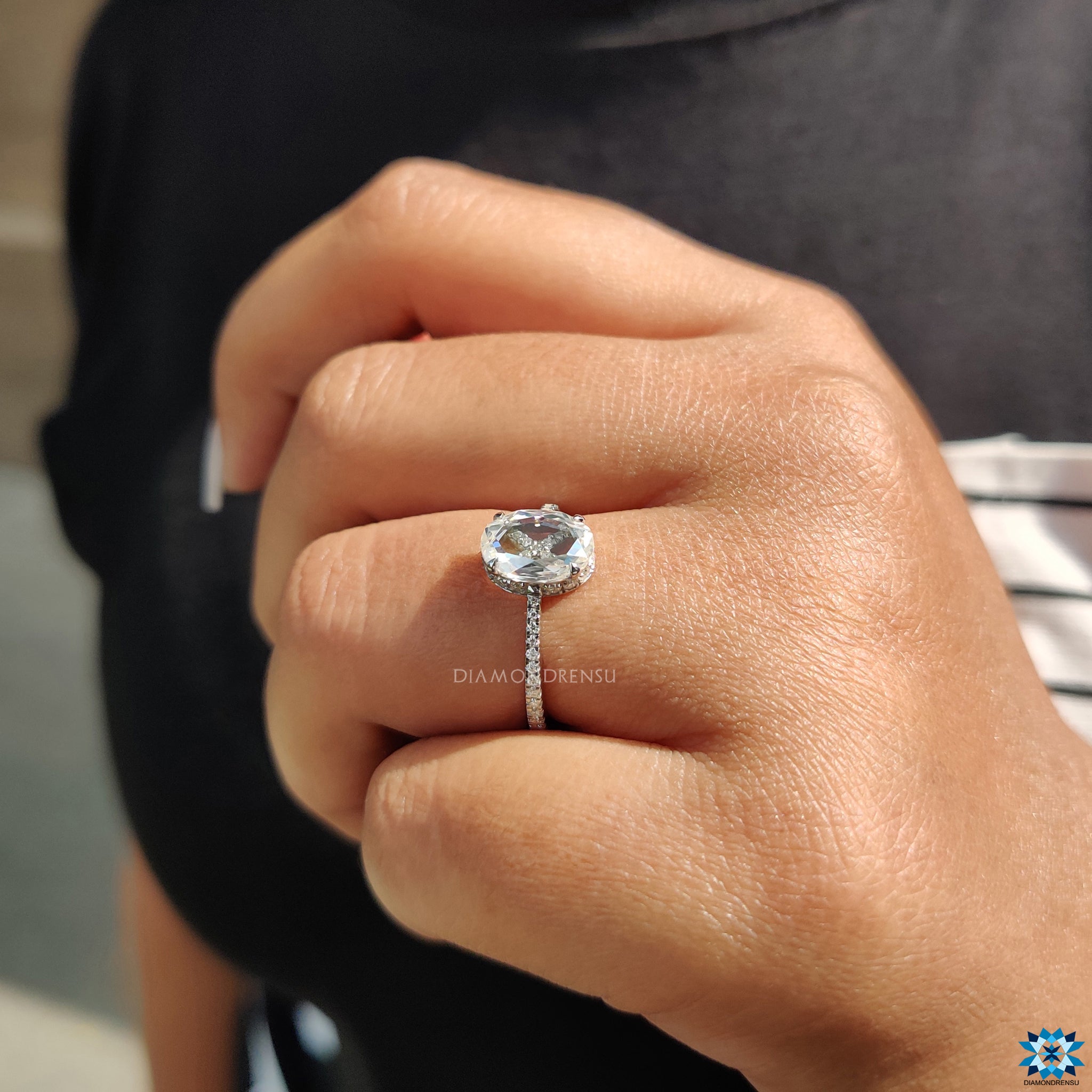 Buy engagement ring with oval rose cut moissanite and white gold band.
