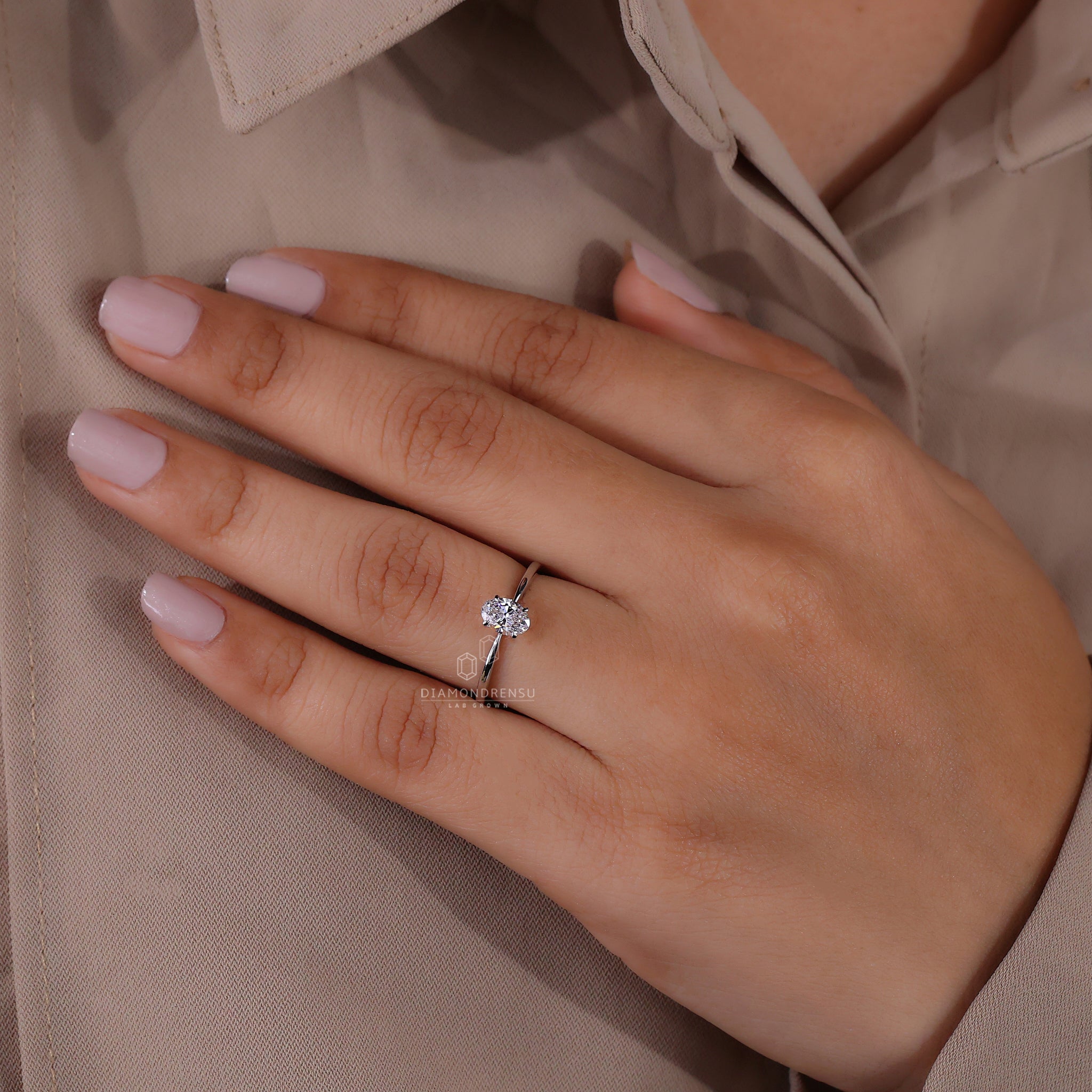 UK engagement ring with tapered shank design.
