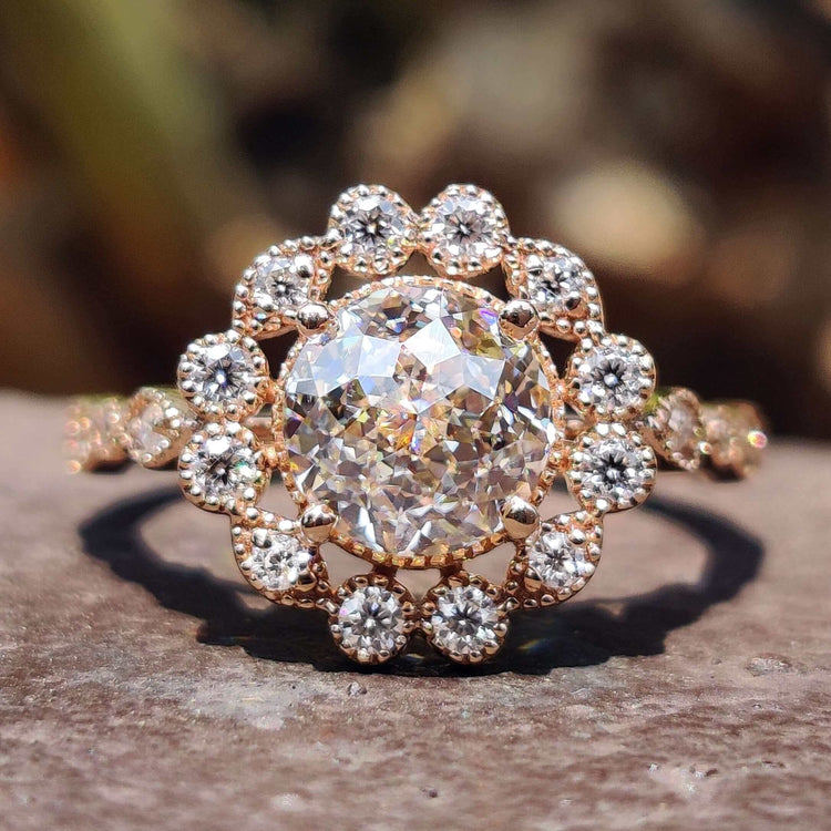 Jubilee cut moissanite ring with vintage engagement design.

