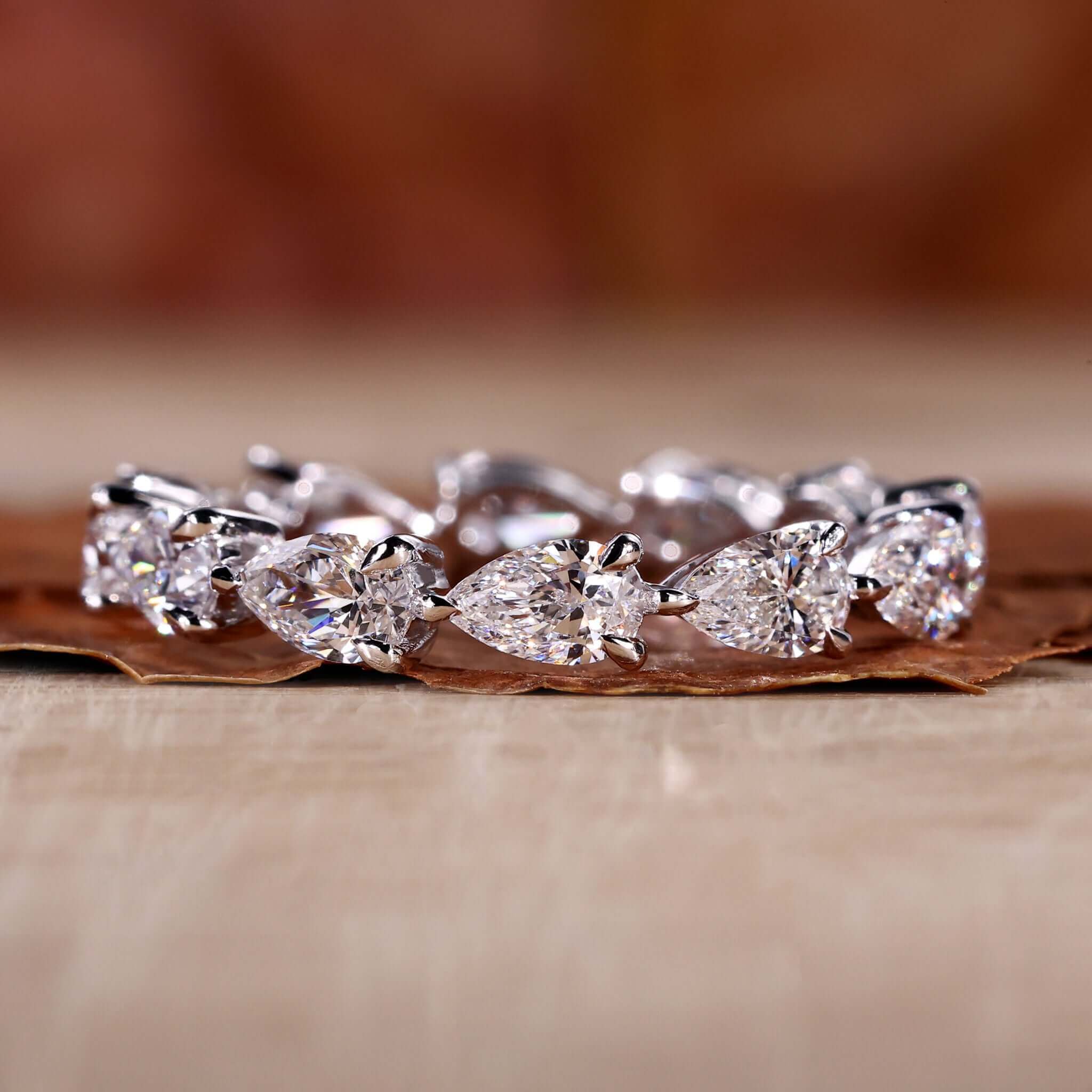 pear diamond wedding band