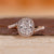 Bypass cushion ring with halo style setting.
