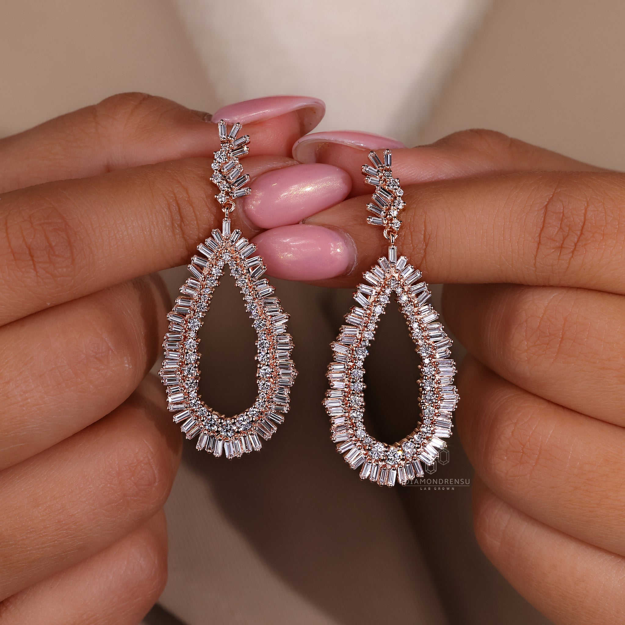 Long cluster setting earrings with prong detail.
