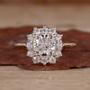 Cushion cut diamond ring in yellow gold.
