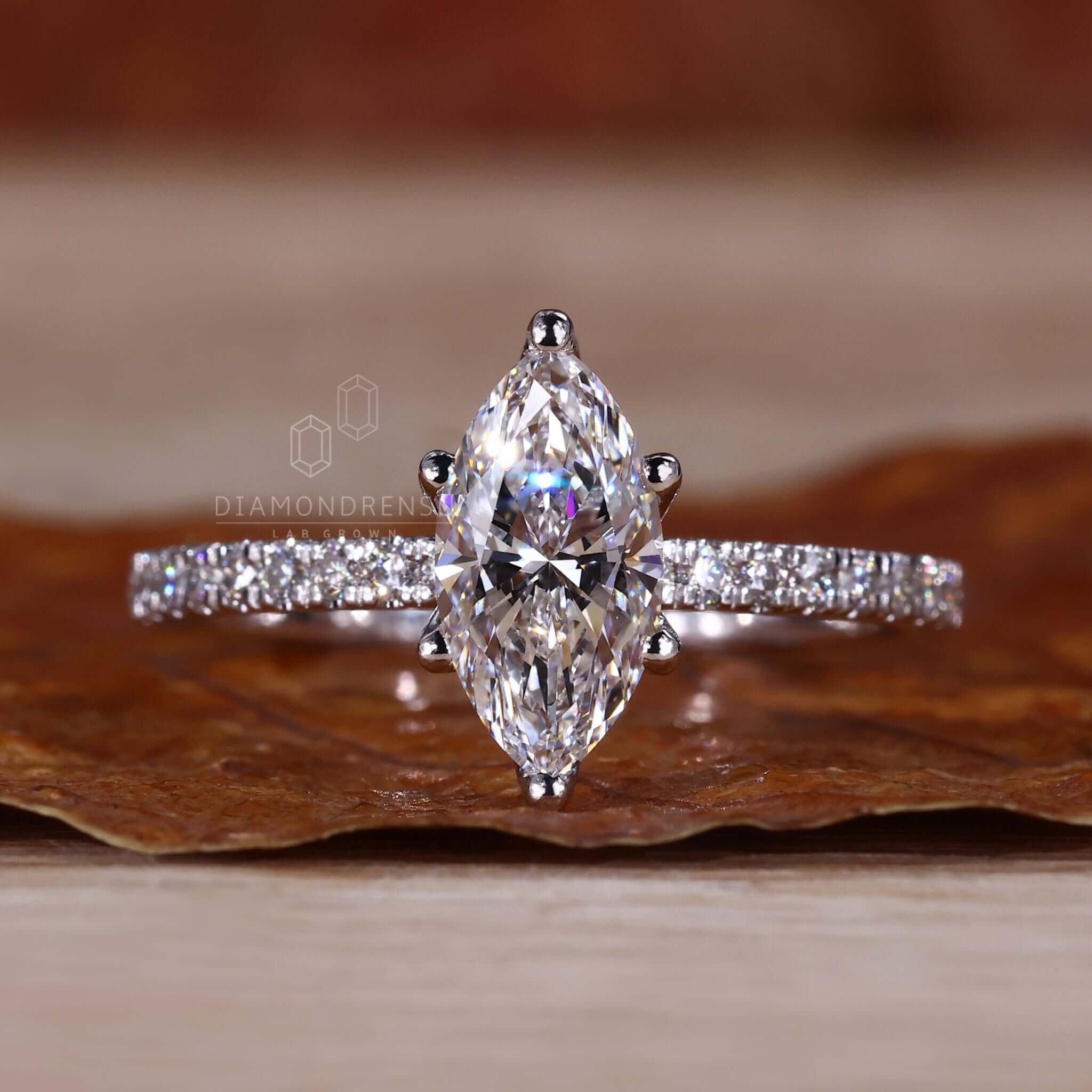 White gold pave diamond ring with a unique 6 prong setting design.