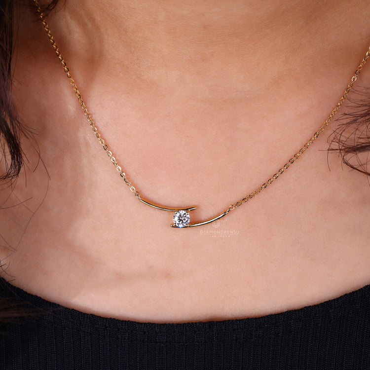 Handmade jewellery piece showcasing a solitaire round diamond pendant.
