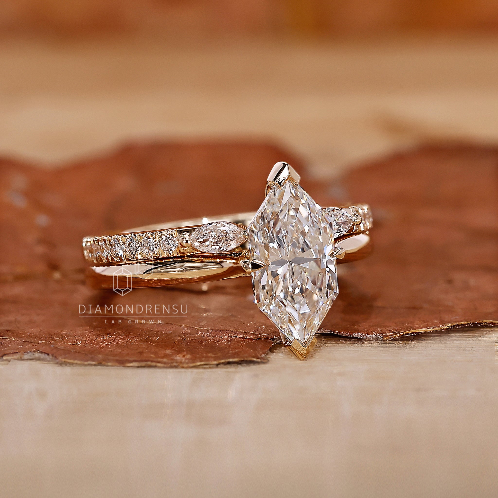 Marquise and round diamond bridal set.
