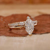 Marquise and round diamond bridal set.
