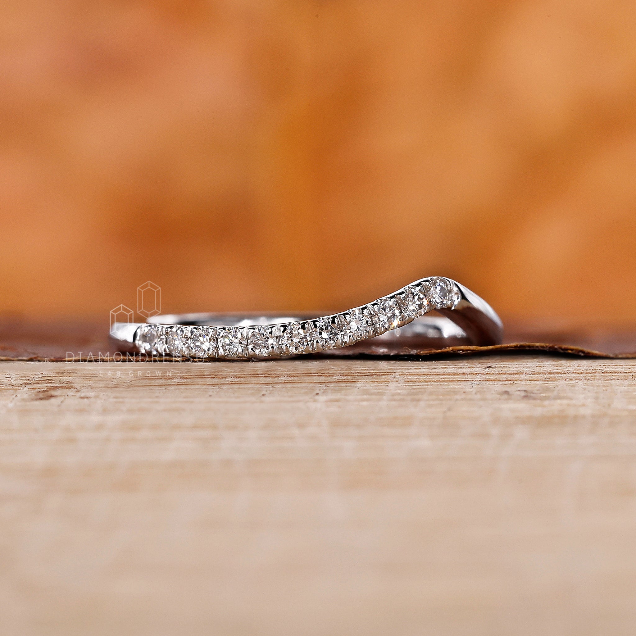 White gold wedding band with round diamond
