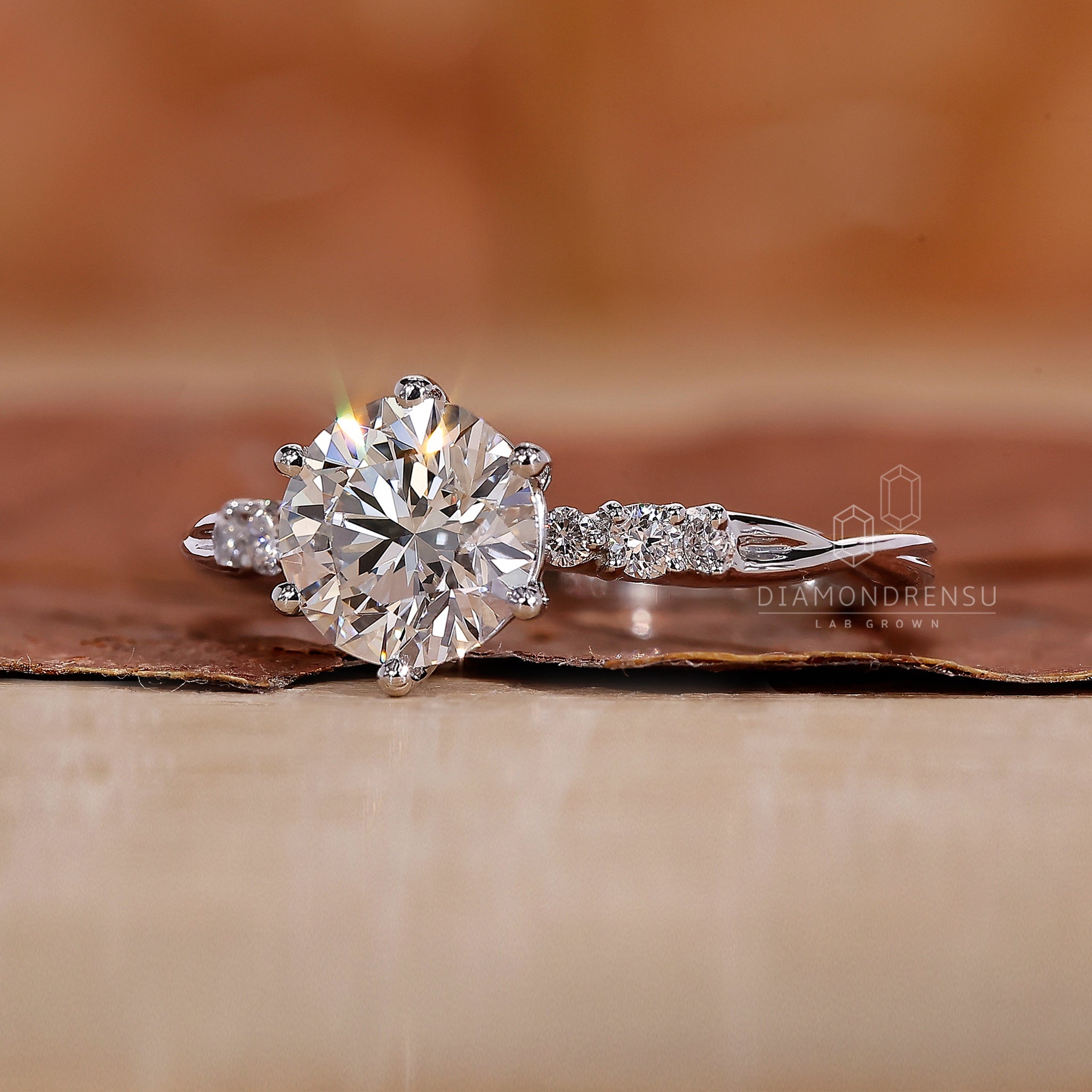 6 prong ring setting holding a lab grown diamond securely.
