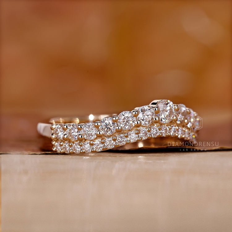 Half eternity curved diamond wedding band.
