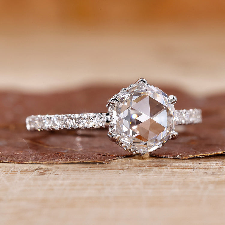 Pave diamond ring with round rose cut engagement design.
