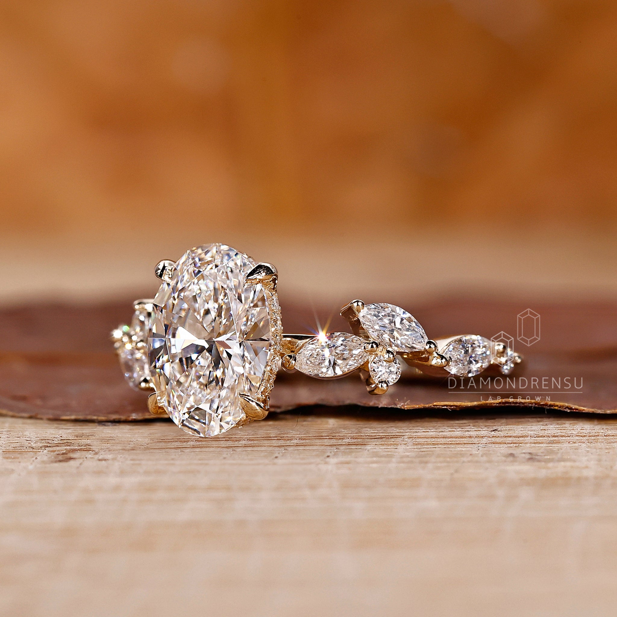 Yellow gold ring with round diamond side stones
