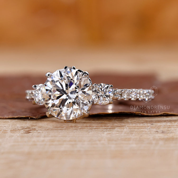 Prong setting ring in pave setting ring style
