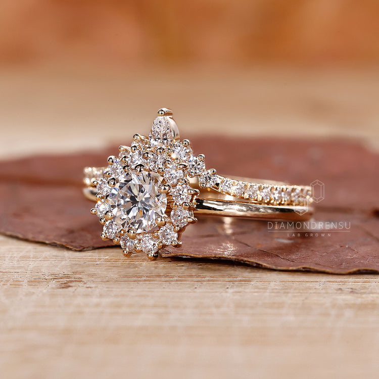 Yellow gold bridal set featuring a custom curved wedding band.
